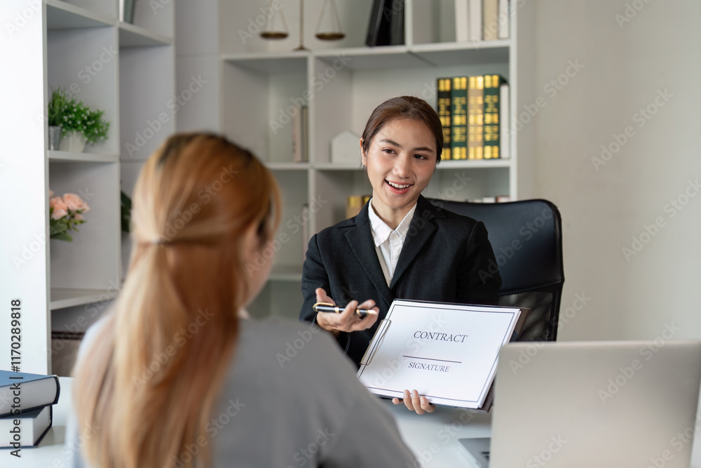 Lawyer discusses contract terms with client in modern office setting professional environment engaging viewpoint Lawyer discusses contract terms with client in modern office setting professional environment engaging viewpoint