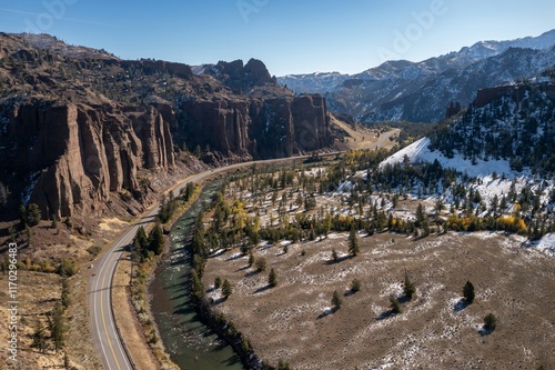 Photos High-angle view of a winding highway through a mountain valley