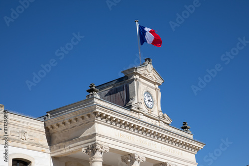 France Republic National flag liberte egalite fraternite, meaning in French liberty equality fraternity on facade marie of Arcachon city hall photo