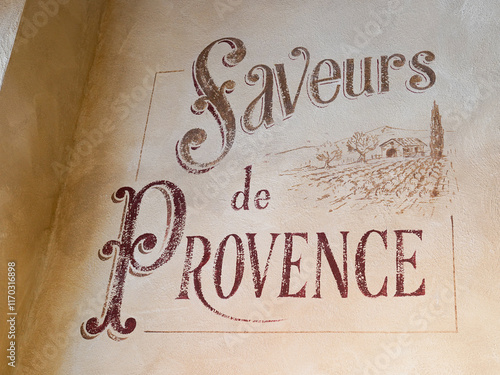 saveurs de provence french text paint on wall means flavors of provence france country with flowers spice photo