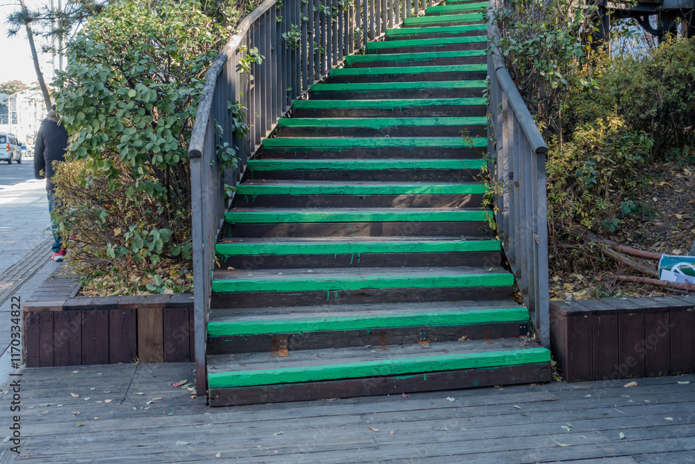 A staircase architecturally connecting upper and lower floors, creating a vertical link between spaces. A staircase architecturally connecting upper and lower floors, creating a vertical link between spaces.