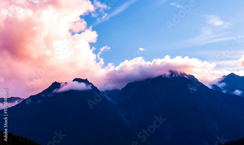 Snow, fog, glacier and ice mountain above clouds under vibrant blue sky view backdrop, background or wallpaper for desktop computer photo