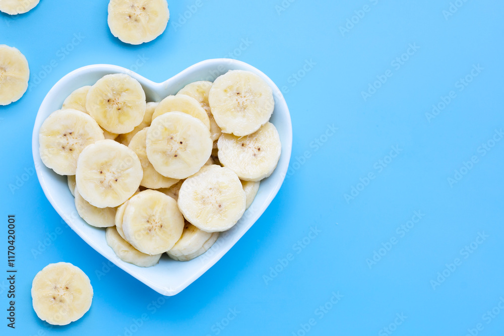 Banana slices on blue background. Banana slices on blue background.