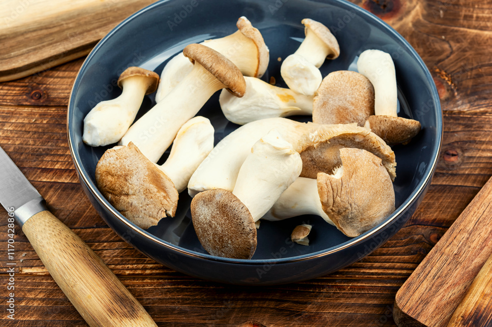 Fototapeta premium Raw mushrooms champignons, cooking fresh champignons.