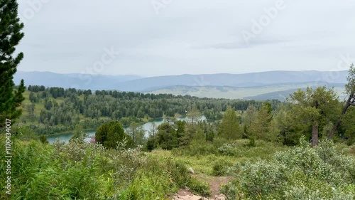 Wallpaper Mural view from the hill to the beautiful mountain lake among the forest and the mountain scenery around. Torontodigital.ca