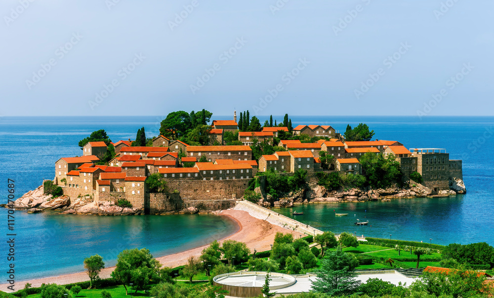 Obraz premium beautiful summer landscape of amazing resort on amazing island with yellow ancient walls and orange tile roofs among sea vawes and nice blue sky on background