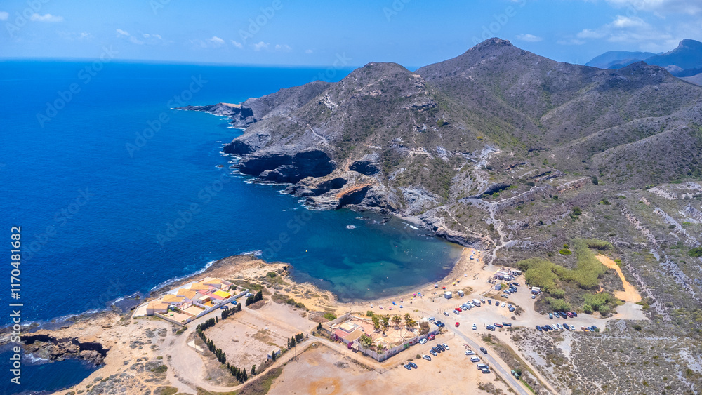 Obraz premium Drone capturing cala reona beach and mediterranean sea in cabo de palos, spain