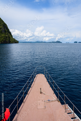 Boat prow and blue ocean, El Nido, Palawan, Philippines photo