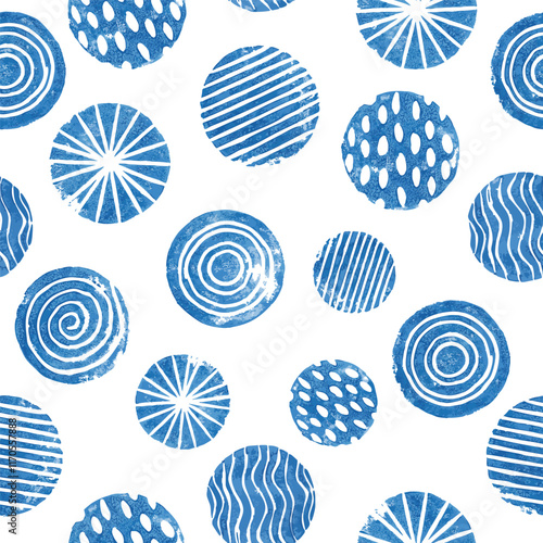 Seamless blue pattern with irregular circular motifs.