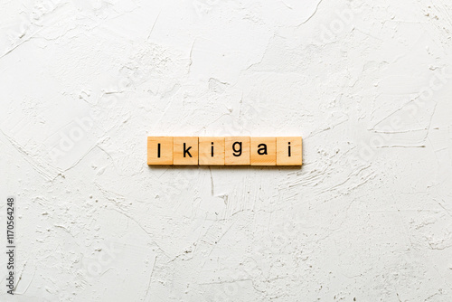 ikigai word written on wood block. ikigai text on table, concept photo