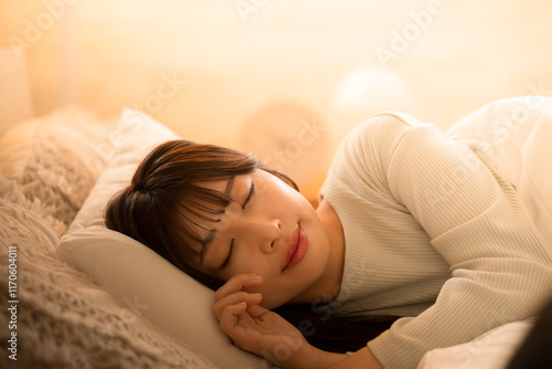 Fotografie Woman falling asleep with indirect lighting Close-up of image of bed sleep and r