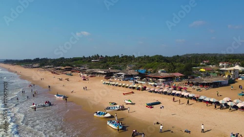 Aerial drone shot of shacks in baga beach in goa. 