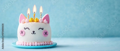 Adorable CatShaped Birthday Cake with Candles on Blue Background photo