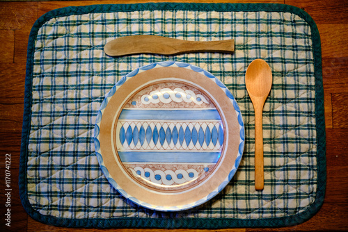Elegant yet unusual breakfast plate and cutlery set, with olive wood cutlery and Persian design plate.