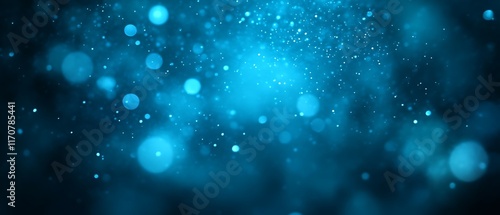 Abstract blue bokeh background with glowing particles.