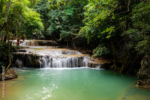 Beautiful and amazing Erawan waterfall in tropical forest of national park, Kanchanaburi, Thailand.