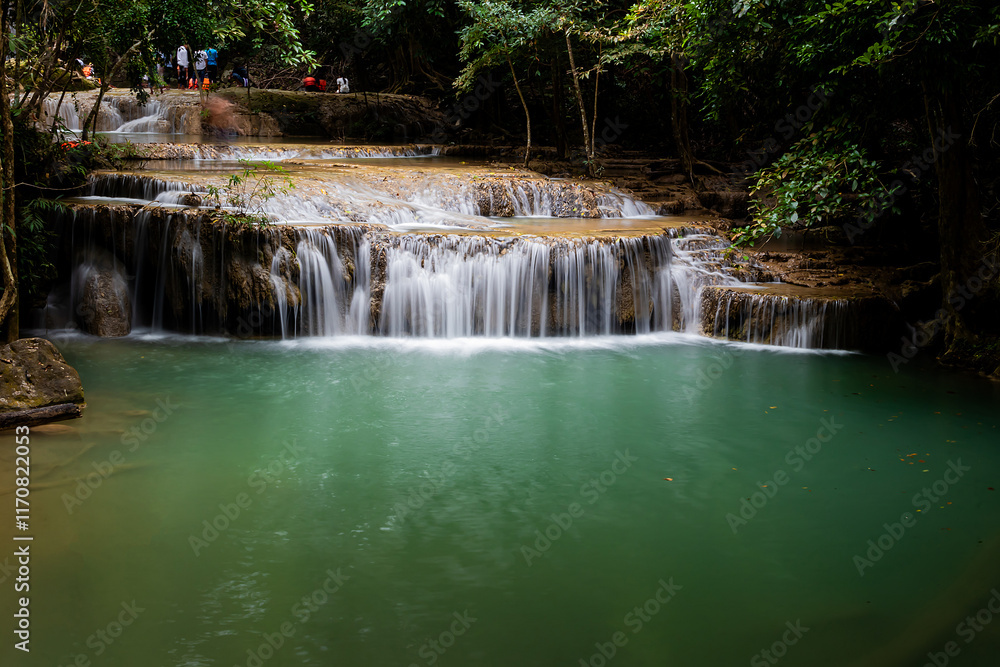 Obraz premium Beautiful and amazing Erawan waterfall in tropical forest of national park, Kanchanaburi, Thailand.