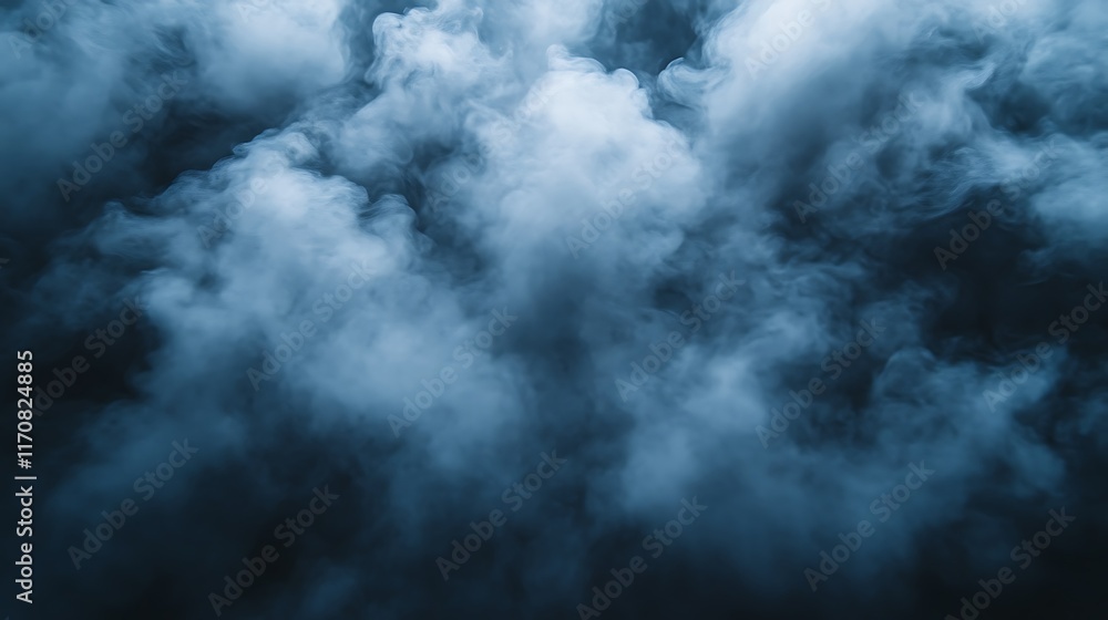 Obraz premium Dense blue smoke clouds on black background.