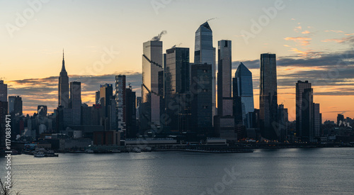 Wallpaper Mural NYC skyscrapers in silhouette stunning morning light, city scape water reflection, background image, world famous destination Torontodigital.ca