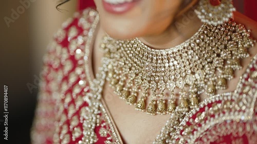 Camera pan over beautiful Gold necklace pakistani bridal getting ready her wedding day, bride wearing