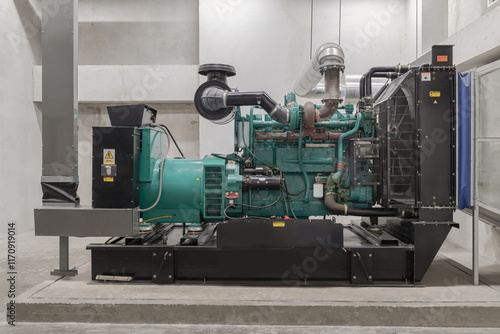 Obraz na płótnie Generator emergency power supply. Engine generator set powered by Diesel power, Reserve diesel engine-generator for maintenance of trouble-free work of electrical installation, Electricity generation. w salonie