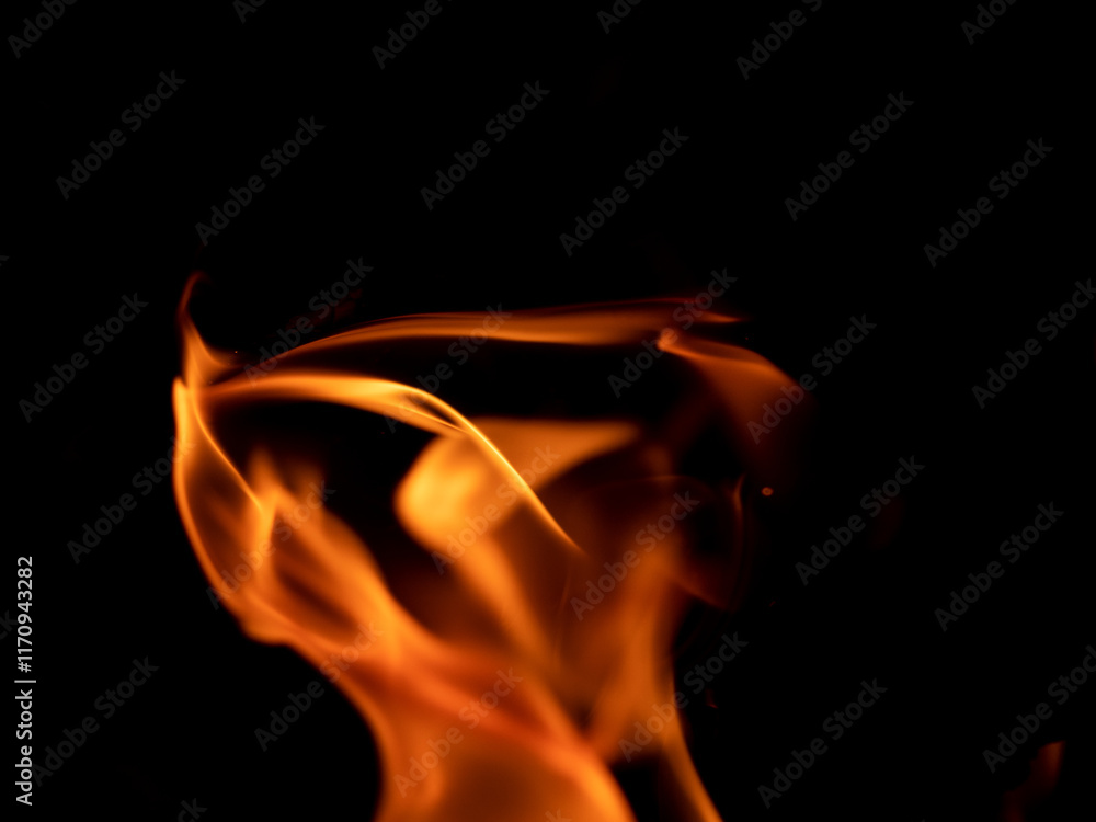 Fototapeta premium Open fire on a black background. Beautiful flame.
