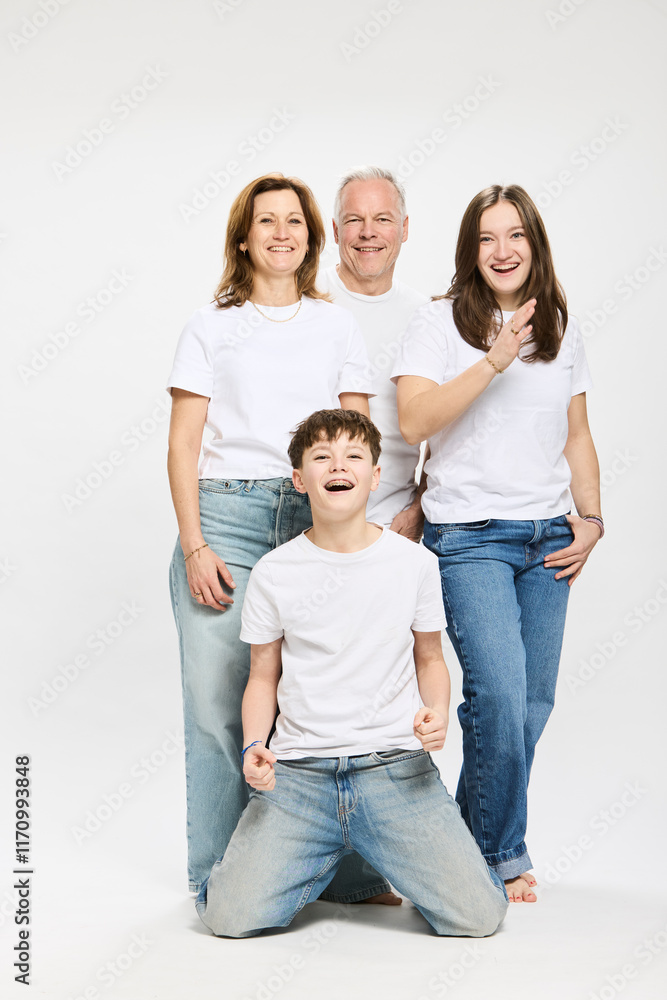 Family portrait of mother and father with two teenage kids. Family portrait of mother and father with two teenage kids.
