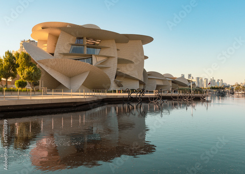 National Museum in Doha, Qatar with a wide angle view of the pool in its garden