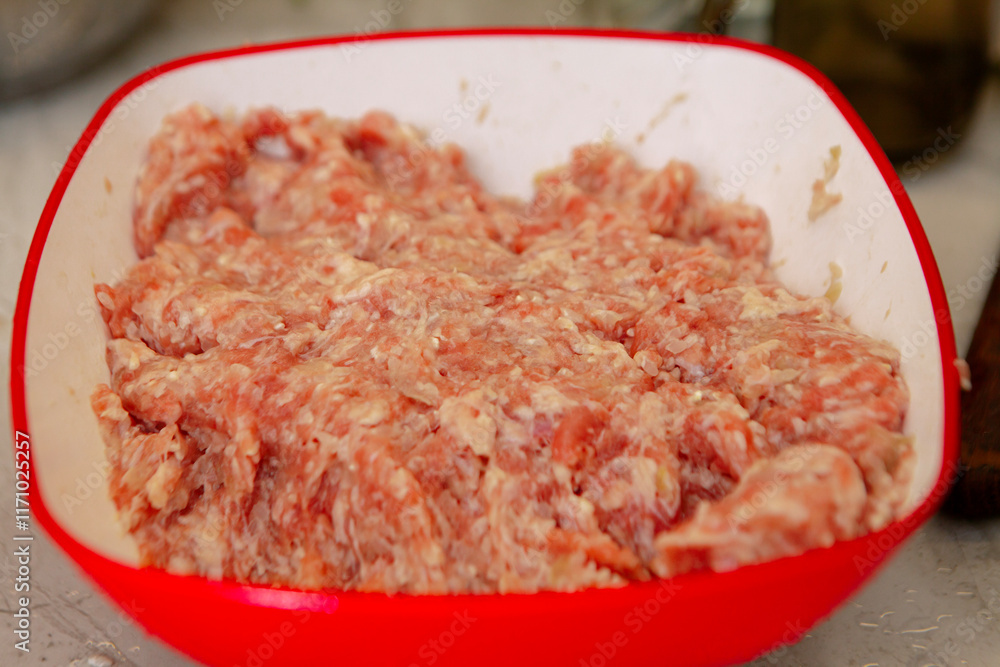 Minced pork meat. fresh beef, chopped through an electric meat grinder. food for dumplings and cabbage rolls, pies. copy space. food. background. soft background. Minced pork meat. fresh beef, chopped through an electric meat grinder. food for dumplings and cabbage rolls, pies. copy space. food. background. soft background.