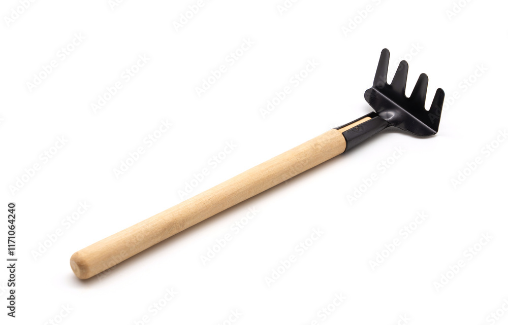 Rake mini portable gardening tool have wooden handle isolated on white background. Rake mini portable gardening tool have wooden handle isolated on white background.