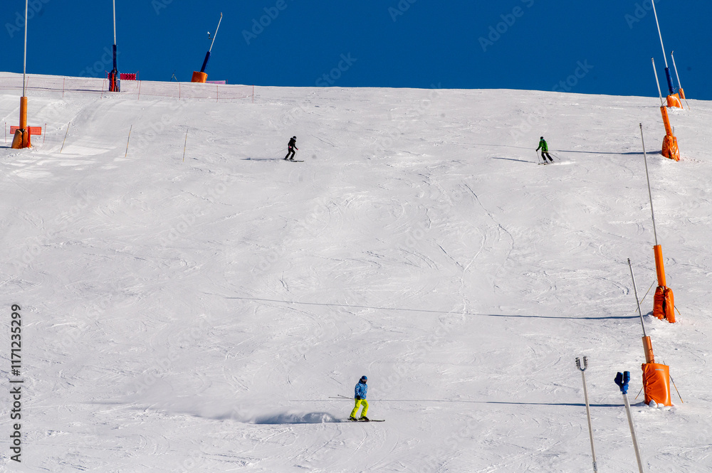 Skiers on the ski slopes in Andorra at Grandvalira in January 2025.