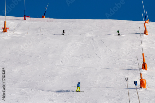 Obraz na płótnie Skiers on the ski slopes in Andorra at Grandvalira in January 2025. w salonie