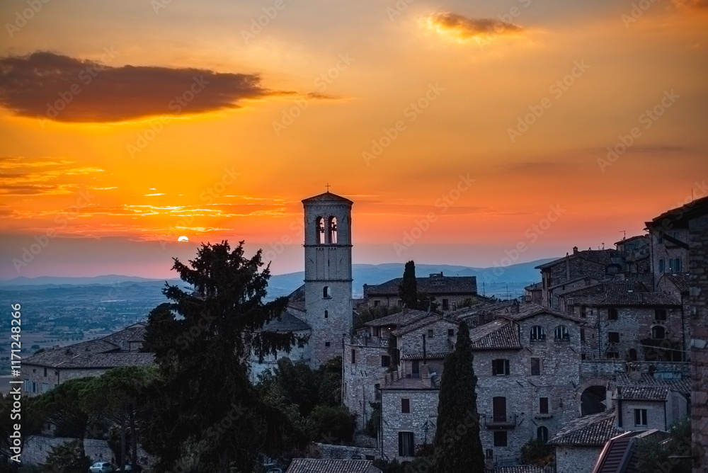 sunset view of the famous city of Assisi in Umbria region, Italy sunset view of the famous city of Assisi in Umbria region, Italy