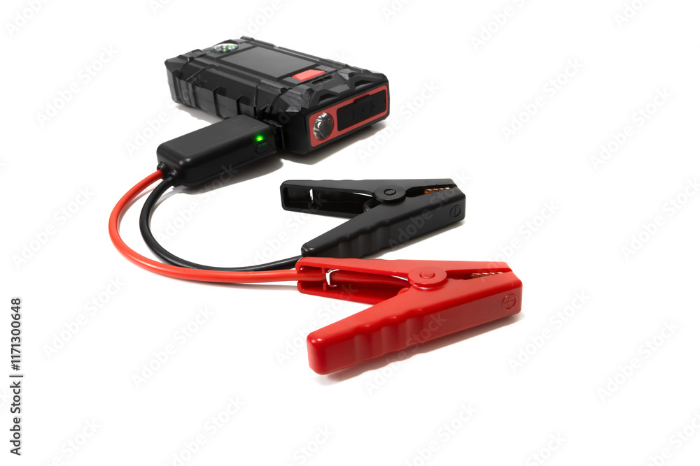 Vehicle battery jump starter. Isolated on a white background. Car, motorcycle, boat, battery, clamp, maintenance. Vehicle battery jump starter. Isolated on a white background. Car, motorcycle, boat, battery, clamp, maintenance.