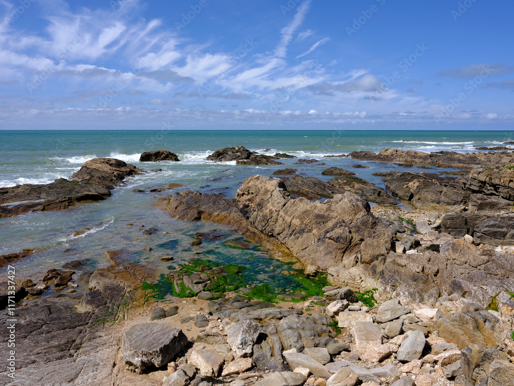 Rocky coastline at low tide in Les Sables d'Olonne, commune in the Vendee department in the Pays de la Loire region in western France Rocky coastline at low tide in Les Sables d'Olonne, commune in the Vendee department in the Pays de la Loire region in western France