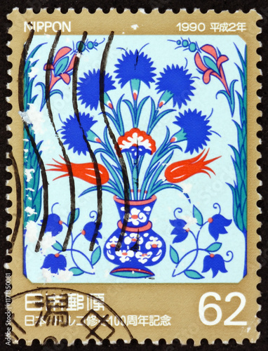 Obraz na płótnie Postage stamp Japan 1990, a 17th-century Ottoman tile with a design of tulips and carnations, the 100th anniversary of Japan-Turkey friendship w salonie