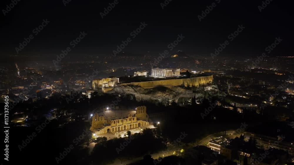 Panoramic aerial night view of the illuminated Parthenon Temple at the Acropolis of Athens, Greece Panoramic aerial night view of the illuminated Parthenon Temple at the Acropolis of Athens, Greece