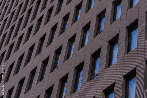 Geometric patterns on modern building facade photo