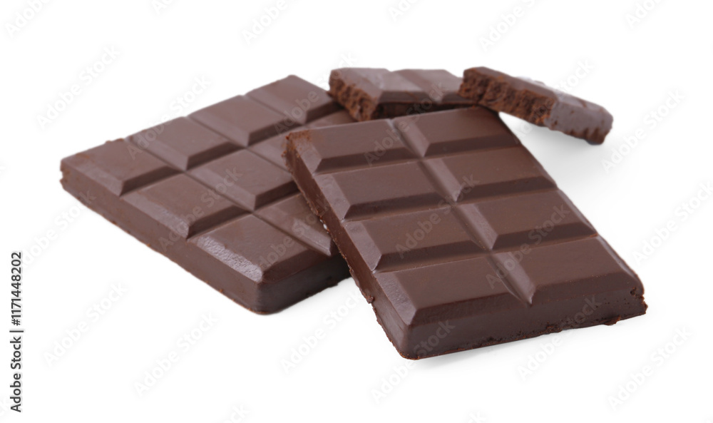 Pieces of delicious dark chocolate bar isolated on white Pieces of delicious dark chocolate bar isolated on white