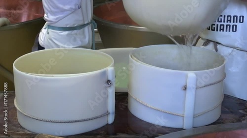 Production of a form of Parmesan cheese - Parmigiano Reggiano - in a dairy in the province of Reggio Emilia, Italy