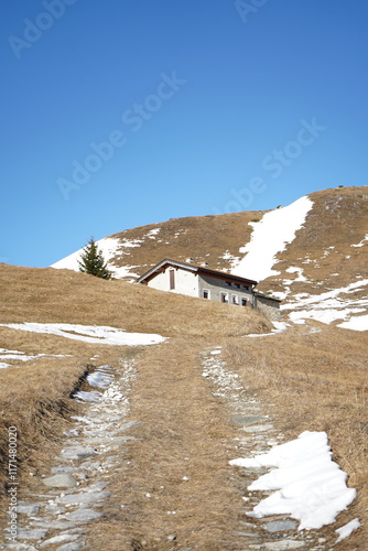 house on the path, Madesimo, Italy photo