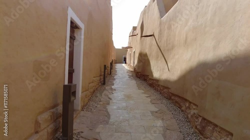 A camera moves down the stret in At-Turaif UNESCO World Heritage Site, Ad-Diriyah, Saudi Arabia