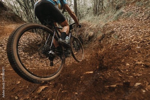 Cyclist Skidding on Dirt in Action with Gravel Bike