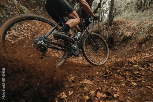 Cyclist Skidding on Dirt in Action with Gravel Bike