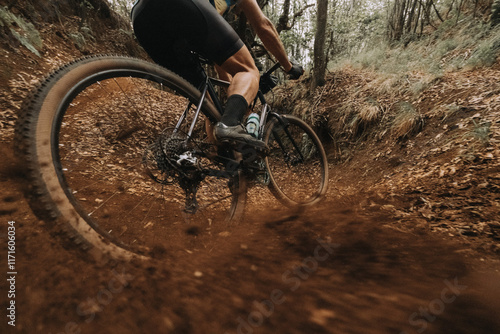 Cyclist Skidding on Dirt in Action with Gravel Bike