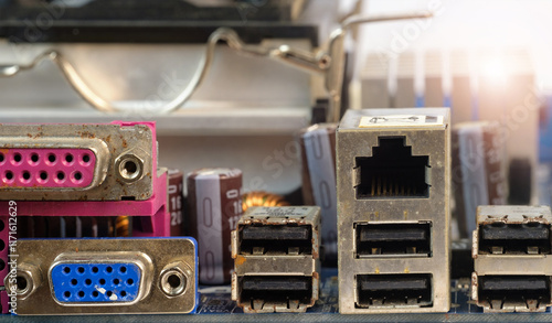 Different computer connectors for different media of a broken rusty computer photo