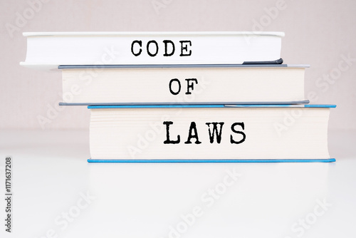 CODE OF LAWS text title book background photo