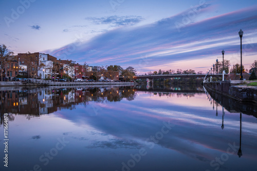 Cityscape of Seneca Falls, New York, along the Cayuga and Seneca Canal at dusk.