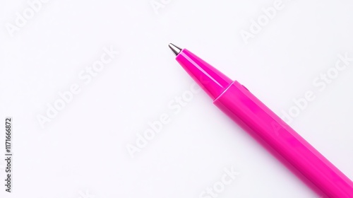 Bright pink pen stands out against pristine white background, hi photo