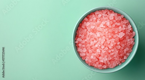 Natural pink salt in a turquoise bowl for culinary uses and decoration